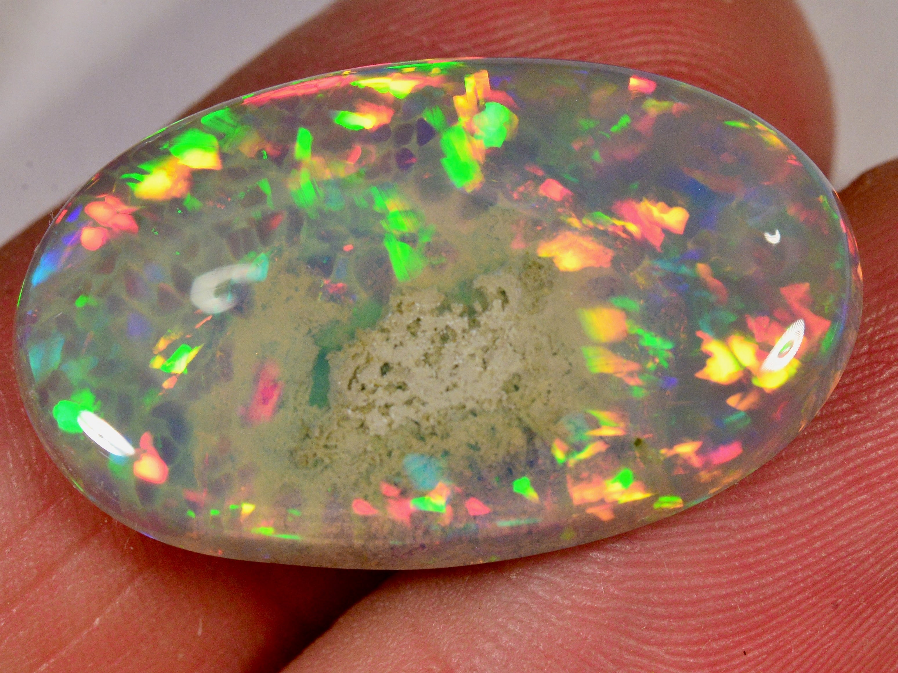 16.2 Karat - Intensiver Äthiopischer Welo Opal mit Matrixgestein - DeinOpal