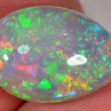 12 carat teardrop-shaped Ethiopian Welo opal with intense colors 